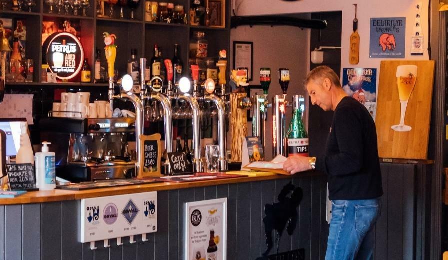 Photo of Craig from Tripel B standing at bar