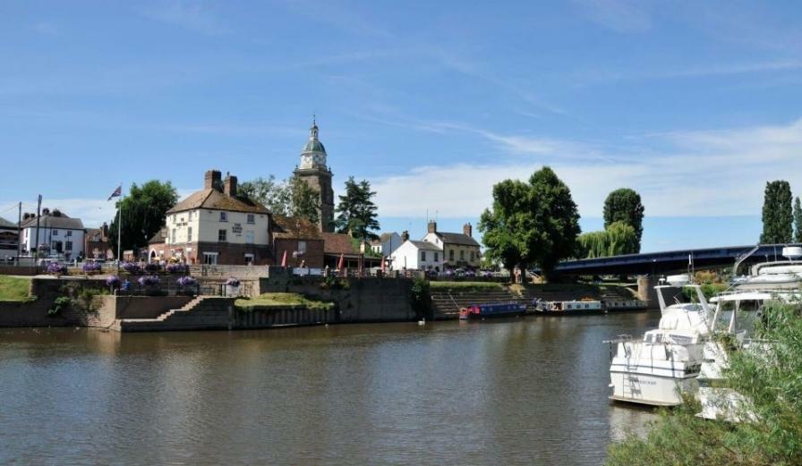 Photo of Upton upon Severn Marina with boats on the river