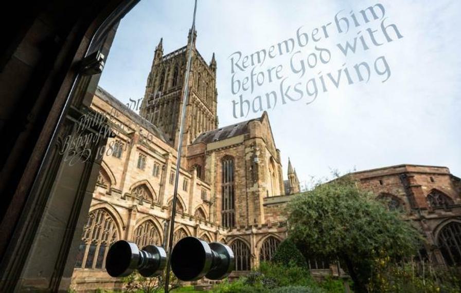 Photo of Worcester Cathedral through a glass door