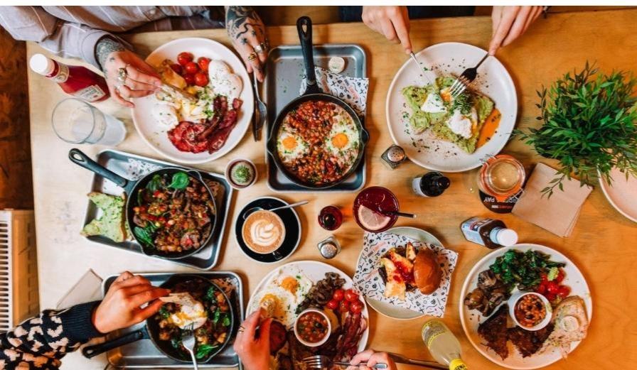 Photo of dishes being served from Waylands Yard