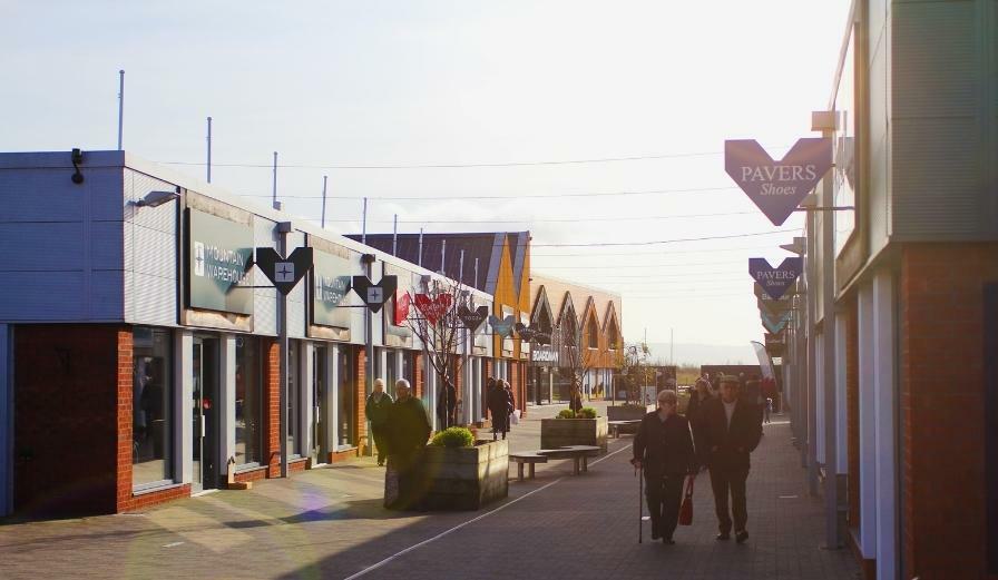 Photo of shoppers walking through The Valley at Evesham