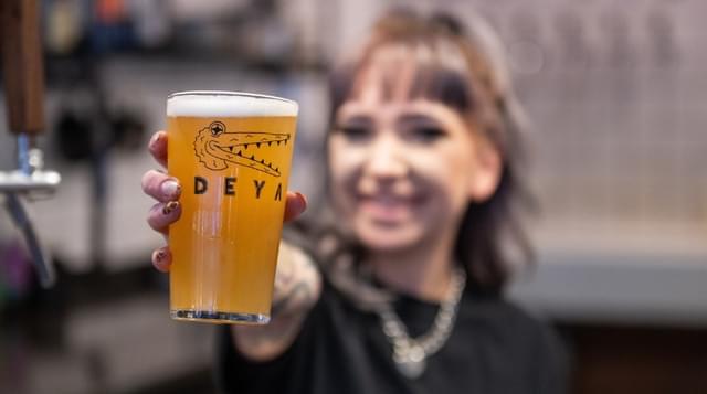 A pint being held at Bayleys of Bromsgrove
