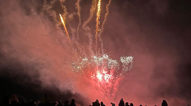 CF Fireworks pink sky and crowd silhouette