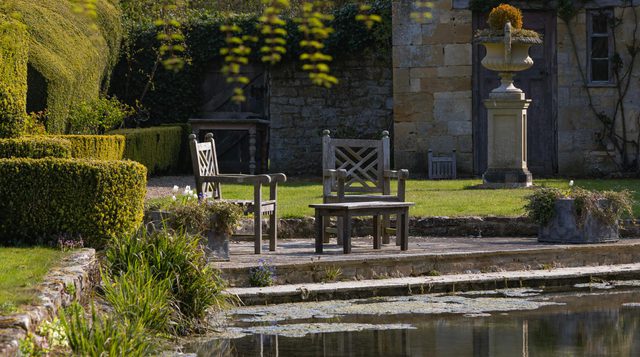 Mill Hay Country House hero image seats by lake