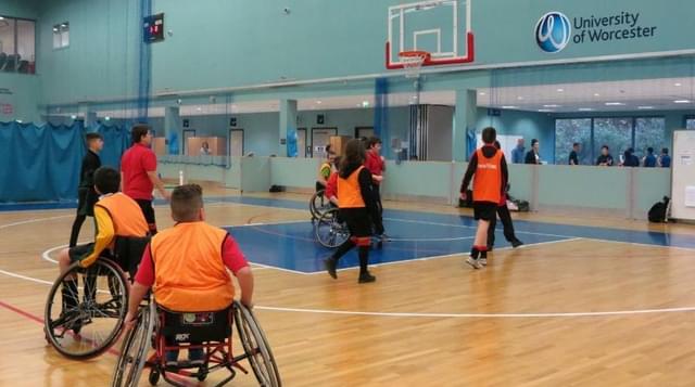 Photo of people playing wheelchair basketball at the University of Worcester