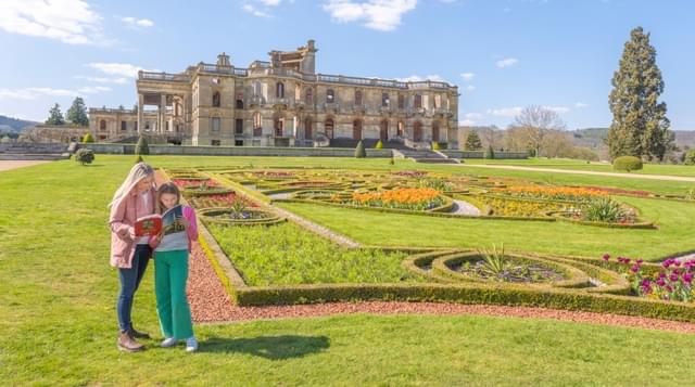 Photo of visitors reading a visitor guide at Witley Court Gardens